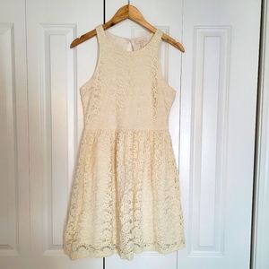A lovely cream colored lace dress size M.